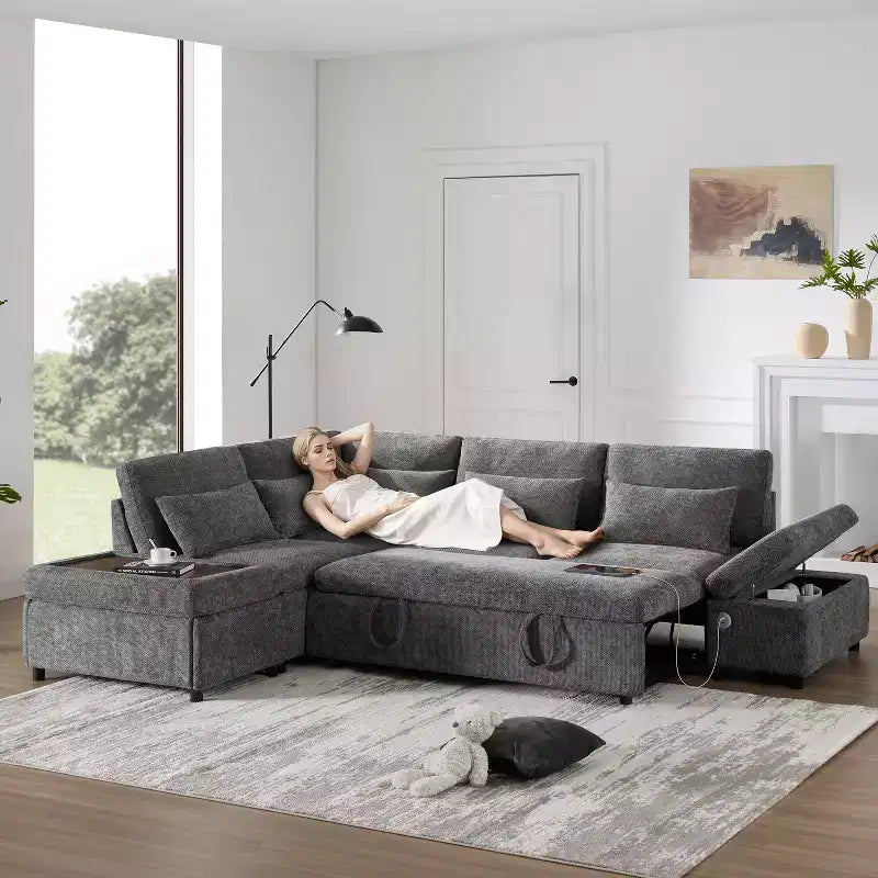 Moderno Divano Sezionale a L Estraibile in ciniglia 107 con Ottomana Contenitore e Console Bracciolo Regolabile con Porte di Ricarica